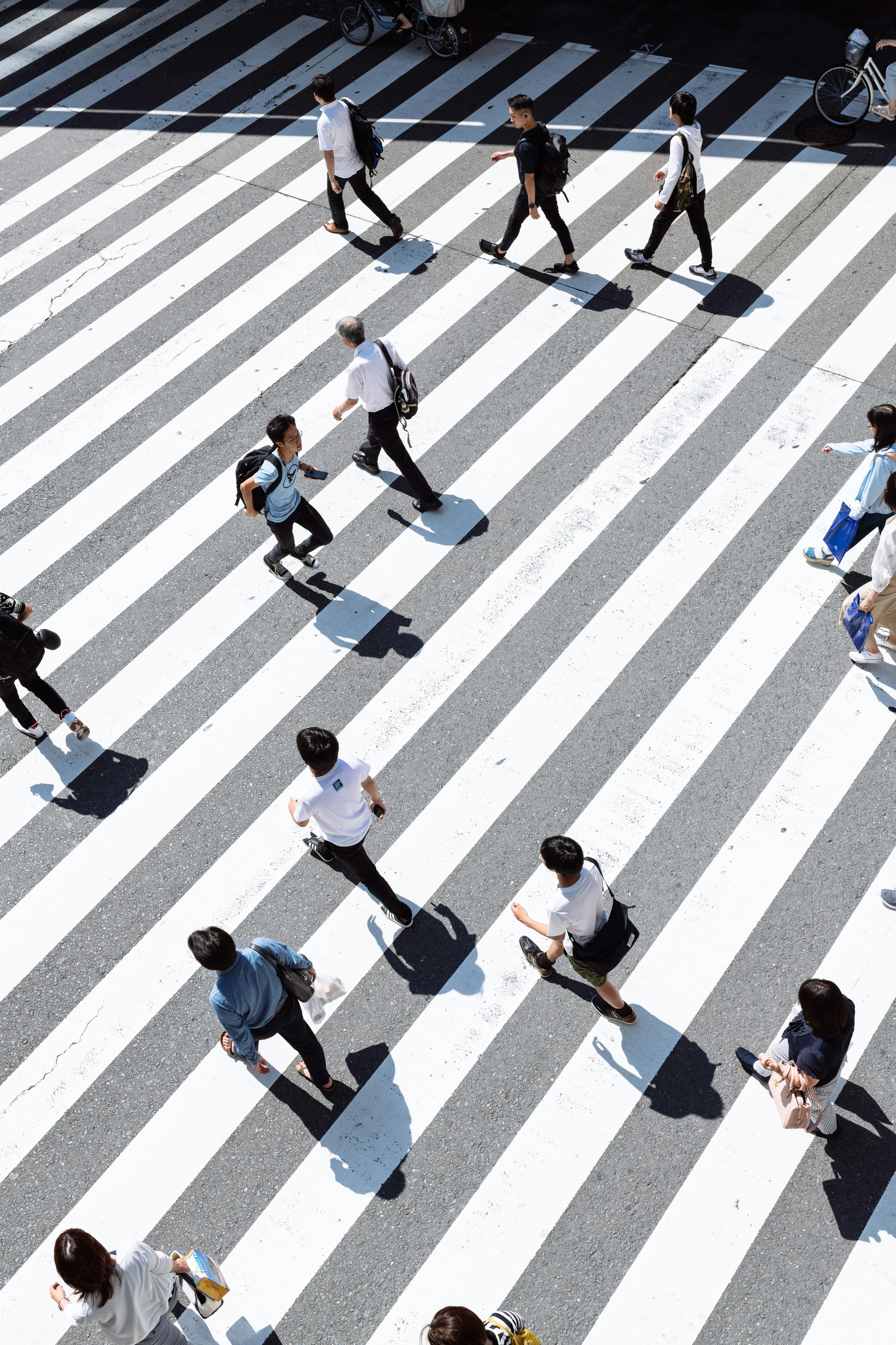 Pedestrians on a zebra crossing in an urban setting